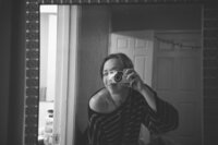anwyn noelle photo on 35mm film, black and white, point and shoot mirror selfie