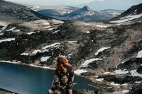 crimson conure photography's kyra eybelman took this photo of herself on beartooth pass while location scouting for an elopement and permits for beartooth pass elopements