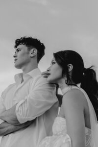 Wedding couple under waterfall