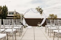 Outdoor wedding ceremony on rooftop at 21C Hotel Louisville Kentucky.
