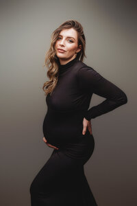 Pregnant mother poses for editorial studio Maternity Portraits at Holy City Babies Portrait Studio in Charleston, SC.