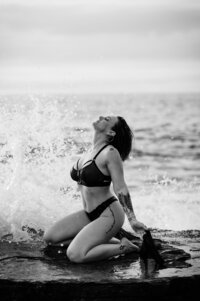 Boudoir experience outside mermaid and crashing waves