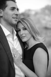 Central park engagement photos, Deborah Zoe Photography. Women and man embrace during engagement session in Central park.