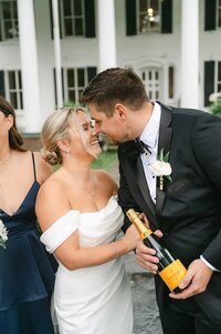 Sweet kiss between bride and groom