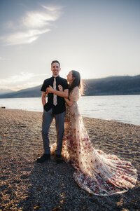 Bride and groom embracing during golden hour adventure elopement glacier natational park