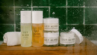 Styled product photography of skincare bottles photographed together to showcase cohesive branding and packaging