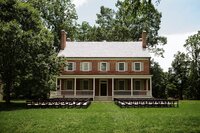Wide view of Locust Grove, a popular Louisville Kentucky wedding venue set for an outdoor ceremony