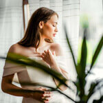 Elegant bridal portrait by the window, captured by a Yorkshire wedding photographer.