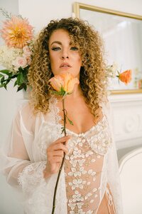 Bridal portrait with single peach rose and dahlia accents by Flowergirl Cville, Charlottesville florist | Photo by Lyn Waldrop Photography