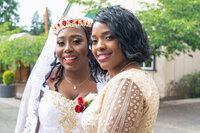 Venice Beach Los Angeles wedding photography portrait of the bride with her sister, captured in true to life color with soft natural light and an emotional documentary style.