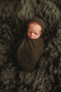 Newborn Photographer in Charleston - Newborn Baby sleeping during Newborn Portrait Session in Charleston, SC.