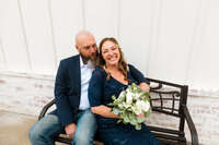 Candid photo of couple laughing and making funny faces at each other after eloping in Murfreesboro