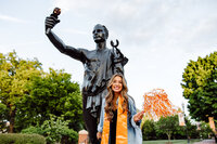 Tennessee graduating senior smiling at camera on campus