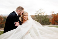 Sevierville, TN wedding photographers capturing joyful bride and groom during golden hour