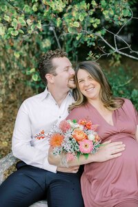 Couple embracing during their maternity session at Eleanor Pardee Park in Palo Alto California