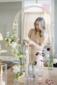 Owner of Flowergirl Cville and Maison Charlottesville, Jennifer, designing custom centerpieces. Photo by Jo Mahoney.