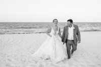 International wedding photographer capture bride and groom during sunset at wedding in Mexico