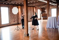 Mahlia and Brittany giving guidance to bridal party