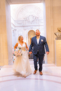 san francisco city hall newlyweds after ceremony