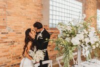 couple kissing at Outreach Event Space