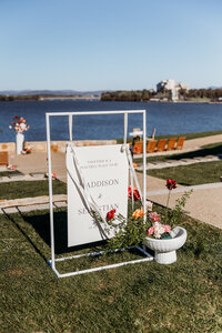 Wedding welcome sign set up at The Marion ceremony space by Lake Burley Griffin in Canberra