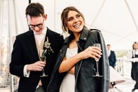 Chic Bride and Groom holding champange flutes