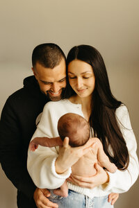 candid photography during a newborn session in Christchurch
