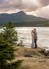 Couple standing on the rocks at Government Cove in the Columbia River Gorge.