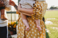 a close up of chubby baby feet during a family photo session.