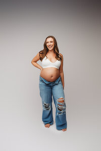 Pregnant mother poses for editorial studio Maternity Portraits at Holy City Babies Portrait Studio in Charleston, SC.