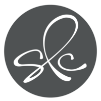 Script logo with letters "SLC"