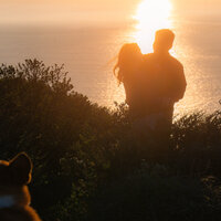 couple dancing in sunset sparkle ocean view in san francisco at battery spencer