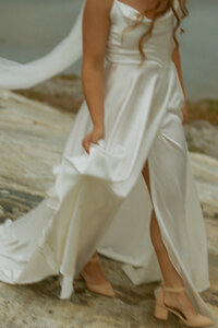 Western Couple Poses for Casual Photo under Veil during Wedding in Edson, Alberta