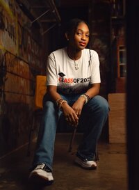 Senior portrait at the theater in Mobile, Alabama -- sitting in a cool pose in the back dressing room.
