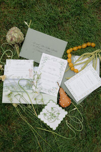 Editorial wedding photography capturing the bride's preparation moments with cinematic elegance at Lion Rock Farm. This fashion forward bridal portrait demonstrates Lauren Alatriste's signature approach to luxury wedding photography, where magazine-worthy composition meets genuine wedding day emotion in Connecticut's most elegant destination venue.