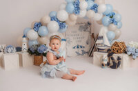 Baby celebrates her 1st birthday with a Cake Smash Photoshoot at Holy City Babies Portrait Studio in Charleston, SC.