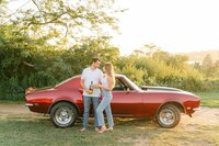 Engagement session with red muscle car connecticut