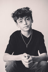 Young boy poses for Personality Portraits at Holy City Babies Portrait Studio in Charleston, South Carolina.