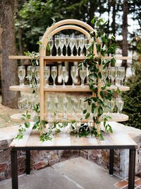 Elegant champagne glass display at Hudson Valley wedding