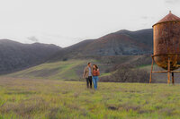 modern couple by water tower engagement photos by mountains in clayton california