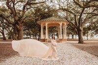 Maternity Photos in Charleston, SC -- Expectant mother poses for Maternity Portraits at White Point Garden in downtown Charleston, SC.