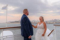 san francisco sunset wedding cruise bride and groom on deck
