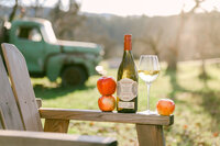 Lifestyle wine photography for a beverage brand with natural light and outdoor styling