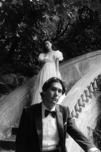 interesting composition of bride and groom on a staircase at Hycroft Manor Vancouver