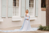 Maternity Photos in Charleston, SC -- Expectant mother poses for Maternity Portraits on Meeting Street in downtown Charleston, SC.