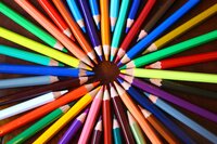 A circle of bright colored pencils - Bloom by bel monili