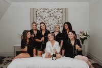 bride-pop-bottles-with-friends
