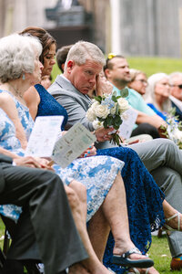 Bride's father wipes away tear during ceremony at Knoxville wedding