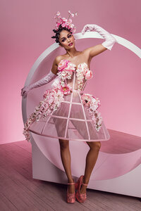 Alyssah in a stylish, playful pose with pastel styling, creating a fun and engaging atmosphere, shot by Ylva Erevall.