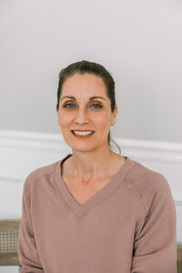 Woman smiling for her headshot
